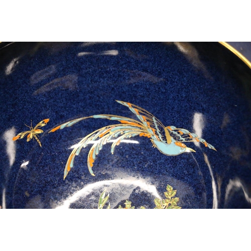 100 - Carlton Ware blue ground bowl, decorated with birds of paradise, butterflies and flowers, 21cm diame... 