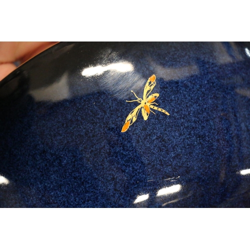 100 - Carlton Ware blue ground bowl, decorated with birds of paradise, butterflies and flowers, 21cm diame... 