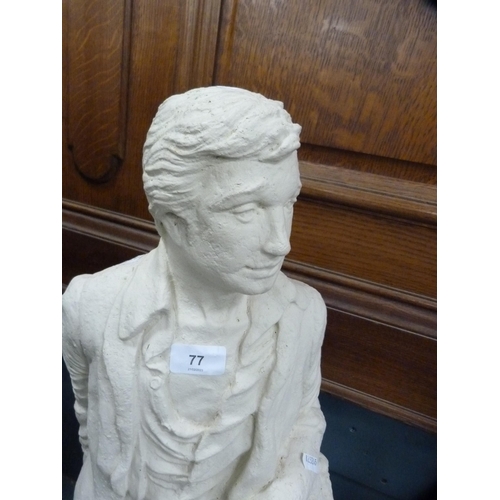 174 - Plaster figure of a male on a naturalistic setting.