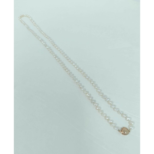 64 - Freshwater pearl necklet on 14k gold snap.