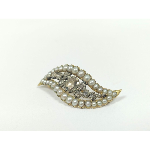 64A - Georgian gold and diamond brooch of waved pointed shape with nine rose diamonds and a border of pear... 