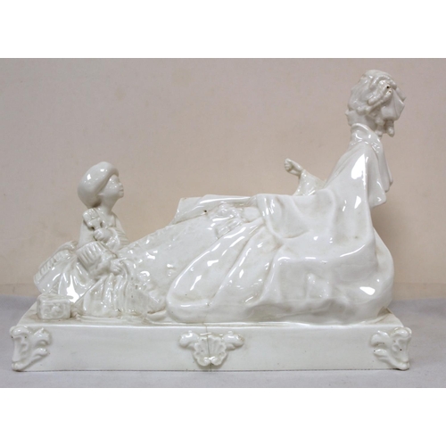 473 - Royal Worcester white porcelain figure group of a lady and her attendant on rectangular plinth base.... 