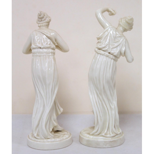 479 - Two Royal Worcester white porcelain figures of classical Greek female musicians modelled by James Ha... 