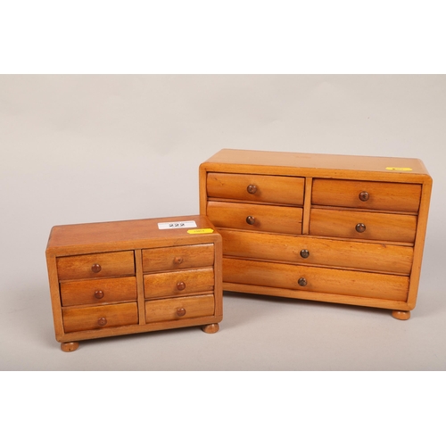 222 - Two small beech table top chest of drawers; 24cm wide