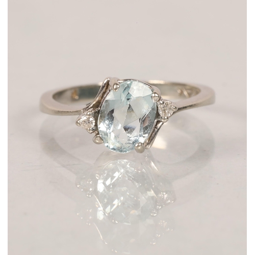 59 - 10 carat white gold aquamarine and diamond ser ring; 2.7g gross weight; ring size L