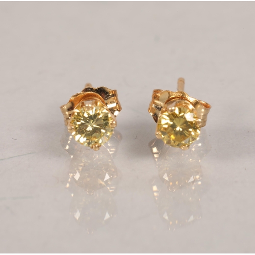 72 - Pair of 14 carat yellow gold mounted set earrings