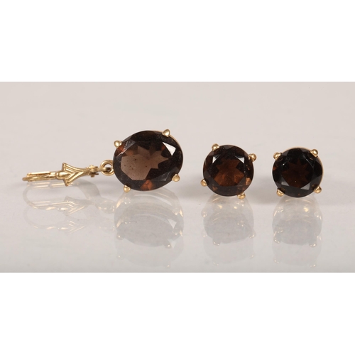 83 - 9 carat yellow gold mounted smoky quartz pendant and matching earrings; 4.6g gross weight