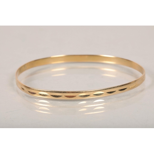 85 - 14 carat yellow gold stiff bangle; 8.3g gross weight