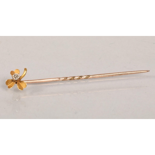 89 - Unmarked yellow gold mounted diamond set pin; 1.4g gross weight