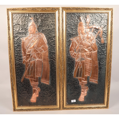 363 - Men in Highland Dress; two embossed copper plaques; framed; 78cm x 34cm (86cm x 42cm)