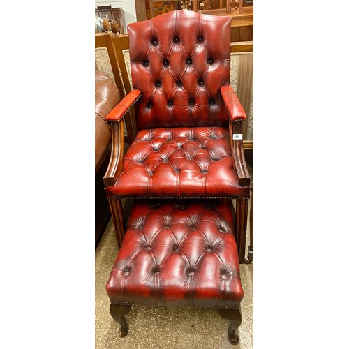 505 - George III style red leather button open arm chair; with matching stool