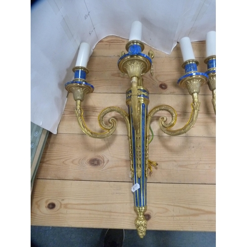 105 - Pair of reproduction neoclassical-style three-branch wall lights.