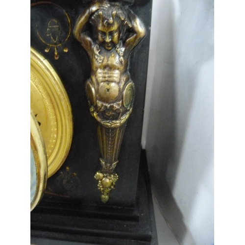 117 - Black slate and marble neoclassical-style mantel clock.