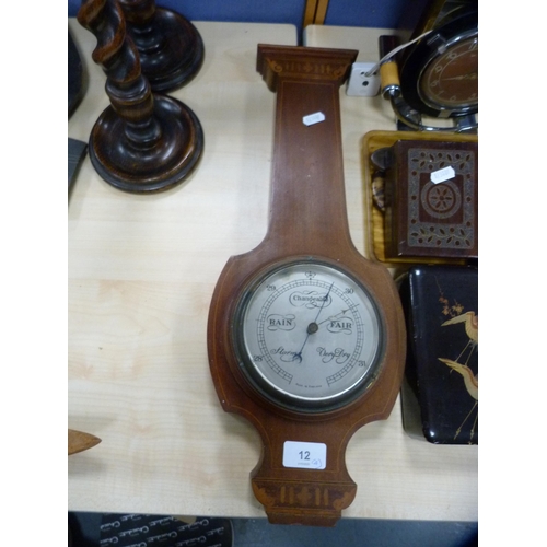 12 - Inlaid mahogany wall barometer, pair of oak spiral candlesticks and a copper bed warming pan.  (4)