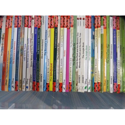 143 - Three cartons containing a large quantity of Ladybird books, various titles.