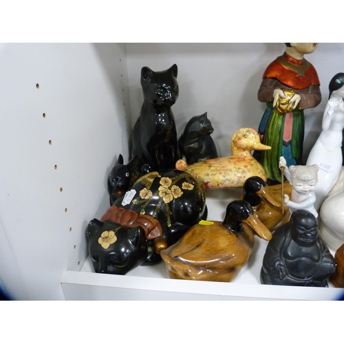 154 - Assorted ceramic and other figures to include Buddha, cats, ducks, sage etc (one shelf).