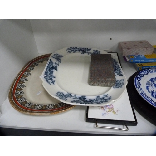 166 - Victorian ashet, tiled tray, brass grilles, large stapler, kitchen mincer, books etc (one shelf).