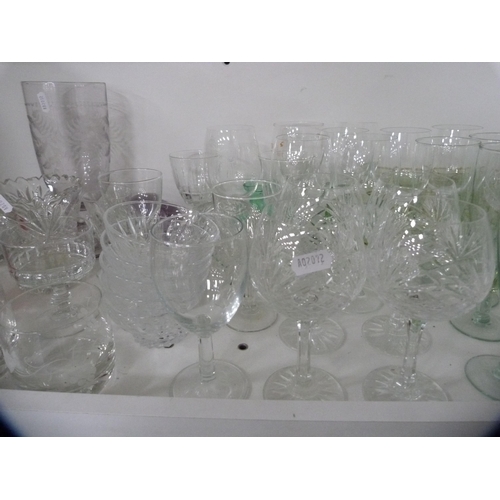 179 - Assorted drinking glasses to include liqueur, wine, also a celery vase etc (one shelf).