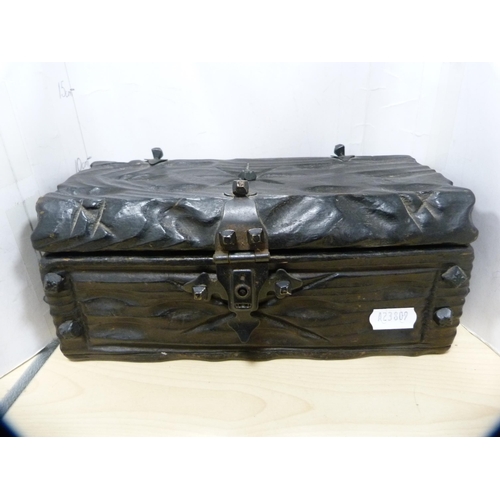 22 - Oriental copper and metal dragon relief decorated box and a Black Forest-style ebonised casket.  (2)