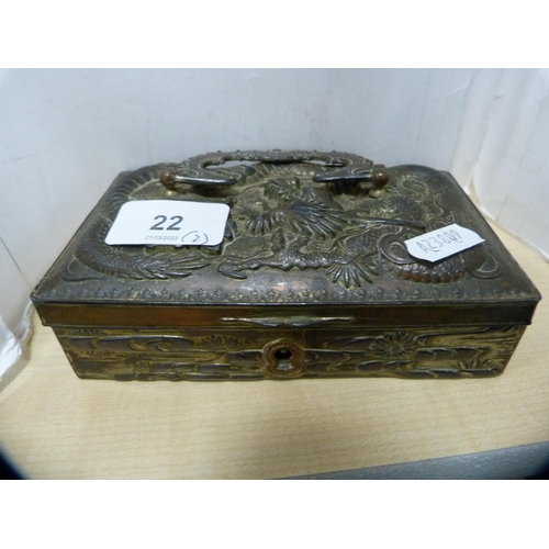 22 - Oriental copper and metal dragon relief decorated box and a Black Forest-style ebonised casket.  (2)