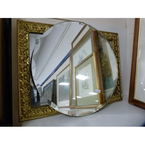 221 - Photograph of an oil rig, eastern picture, brass-framed wall mirror and an unframed circular wall mi... 