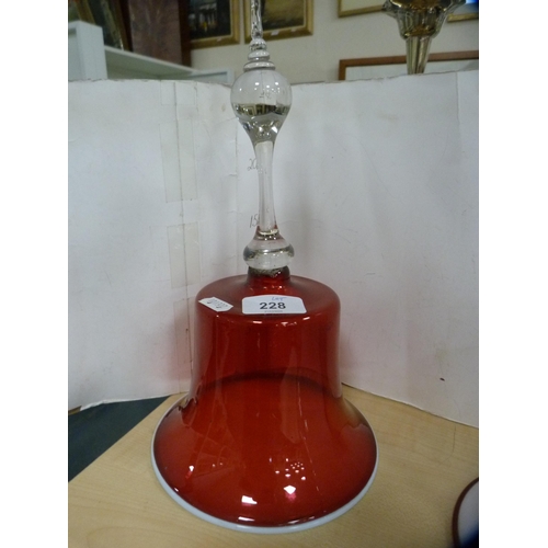 228 - Cranberry glass bell ornament and another, opaque glass, Bohemian-style ruby glass decanter on stand... 