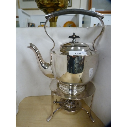 234 - Antique three-piece embossed EP tea set and a spirit kettle on stand.