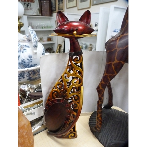 244 - Contemporary wooden figure of a giraffe and a contemporary metal figure of a cat.  (2)