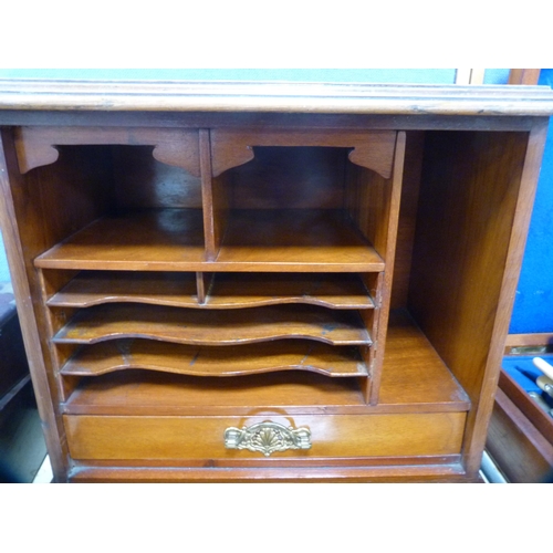 25 - Edwardian writing cabinet with fall front and tooled panel.