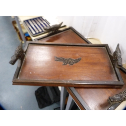 258 - Set of three graduated African-style hardwood serving trays.