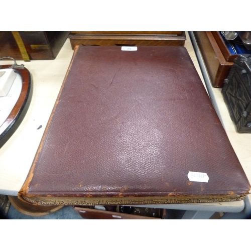 26 - Tooled leather photograph album enclosing vintage tourist photographs including Canada, Cologne and ... 