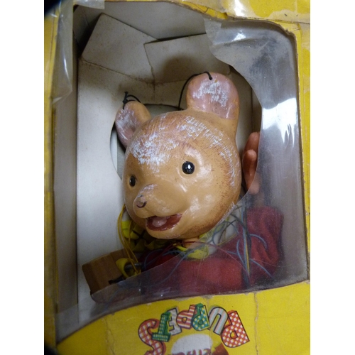 264 - Pelham Rupert the Bear puppet, Pedigree doll in original box and another boxed doll.  (3)