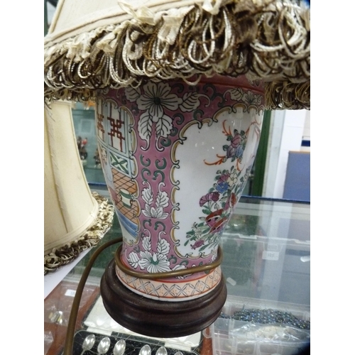 265 - Two Chinese-style table lamps and shades and a Chinese-style vase.  (3)