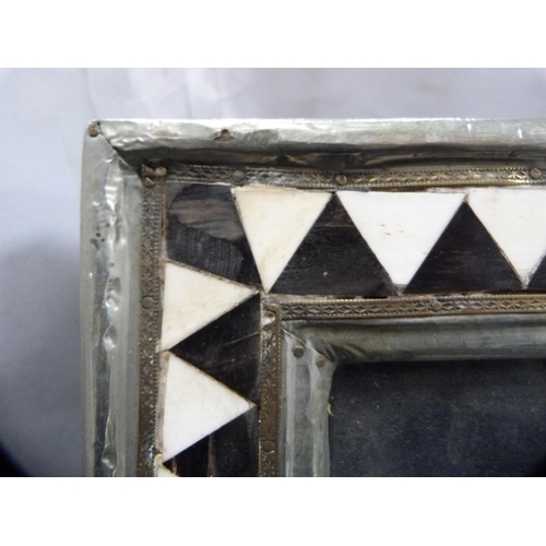 268 - White metal, ebony and bone decorated photograph frame.