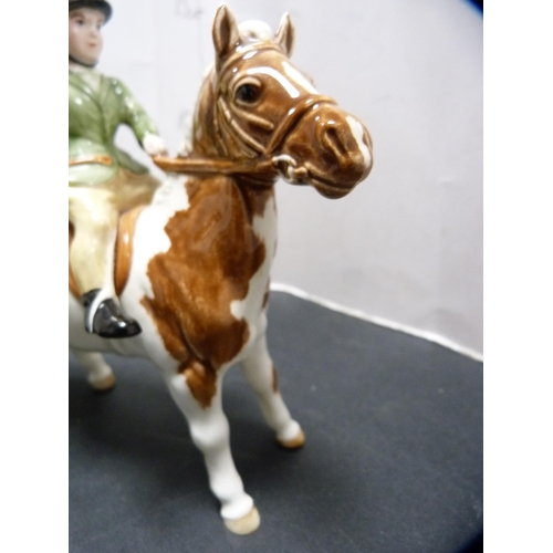 278 - Norman Thelwell-style Beswick model of a girl riding a horse.