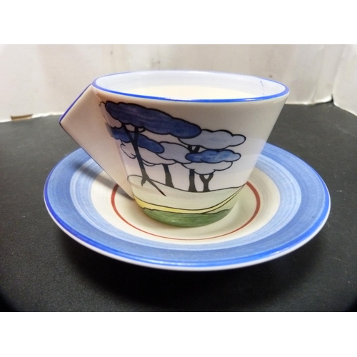 289 - Wedgwood for Clarice Cliff conical 'Blue Firs' pattern tea cup, saucer and plate, based on a Clarice... 