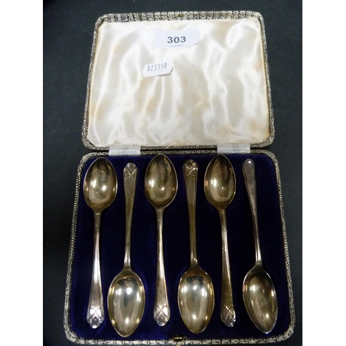 303 - Set of six silver golfing-themed teaspoons, cased.