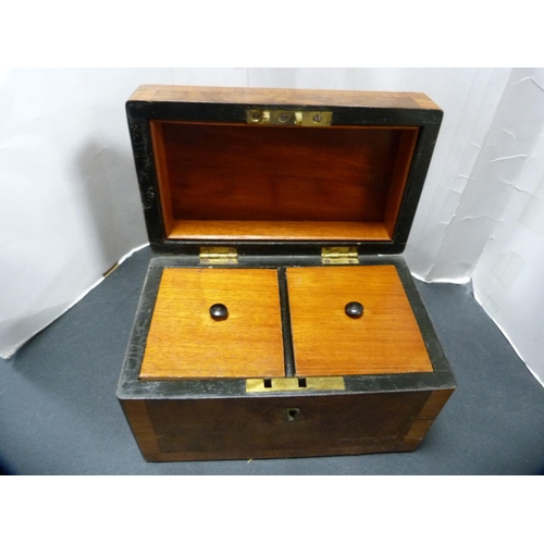 304 - George III walnut crossbanded tea caddy with twin compartments.