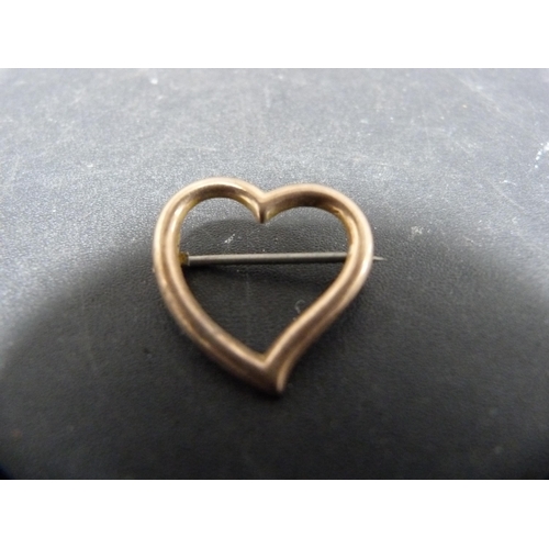 317 - 9ct gold ring and a 9ct gold heart-shape brooch with pin attached, 3.9g gross.