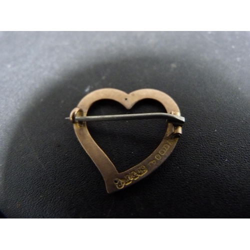 317 - 9ct gold ring and a 9ct gold heart-shape brooch with pin attached, 3.9g gross.