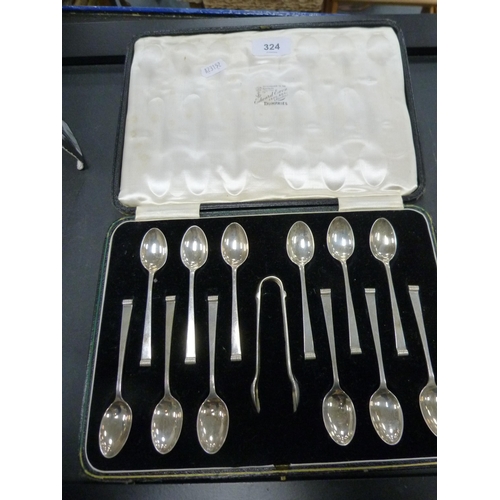 324 - Set of twelve silver teaspoons and tongs, cased.