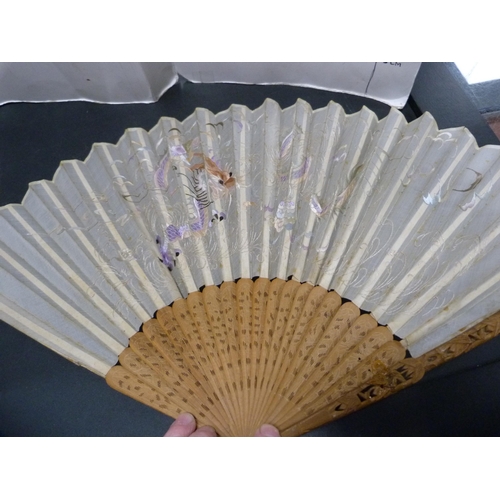 326 - Oriental sandalwood folding fan and two other folding fans.  (3)