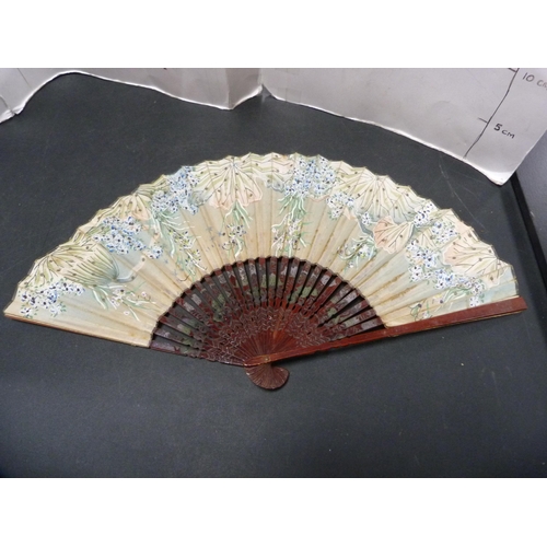 326 - Oriental sandalwood folding fan and two other folding fans.  (3)