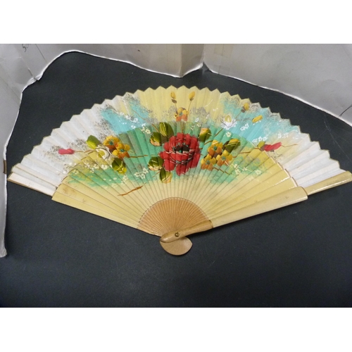 326 - Oriental sandalwood folding fan and two other folding fans.  (3)