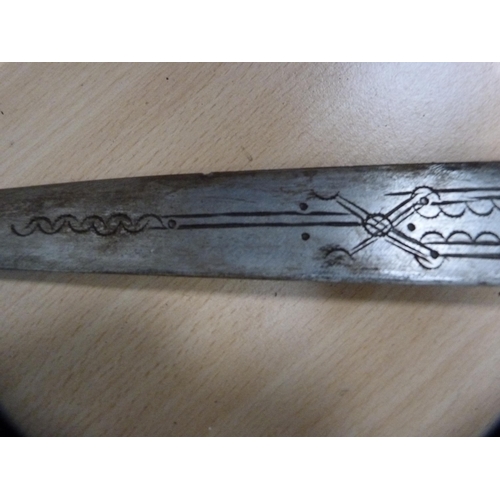 335 - Middle eastern short sword with etched blade and leather scabbard.