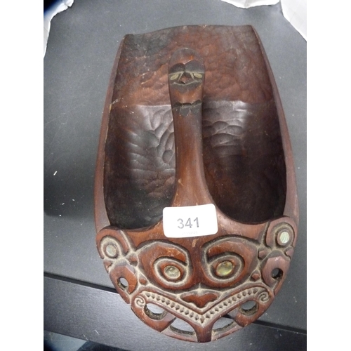 341 - Maori canoe bailer with mask and mother of pearl decoration.