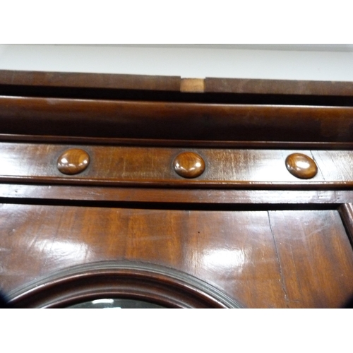 357 - Victorian mahogany library bookcase with Gothic-influenced roundels to the shaped cornice above thre... 