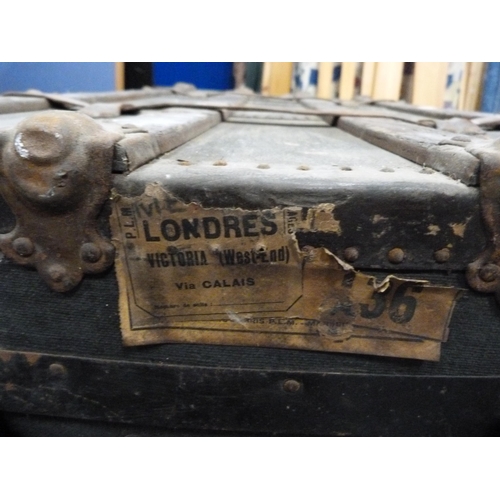 4 - Wood-bound travel trunk containing a Gladstone bag.