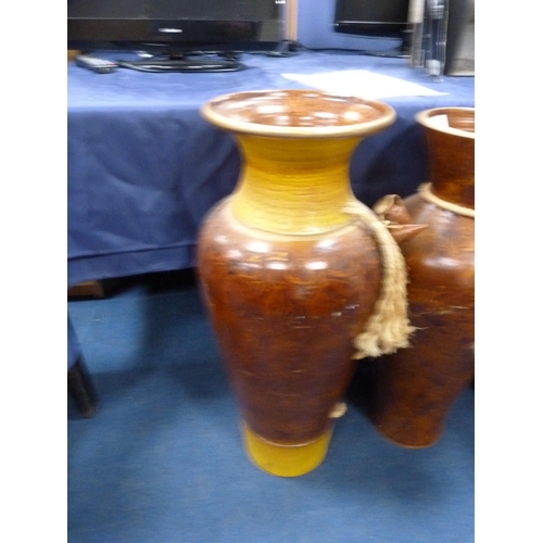 41 - Three similar large graduated eastern vases.