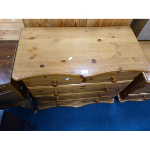 504 - Modern pine serpentine chest of two short and three long drawers and a matching three-drawer bedside... 